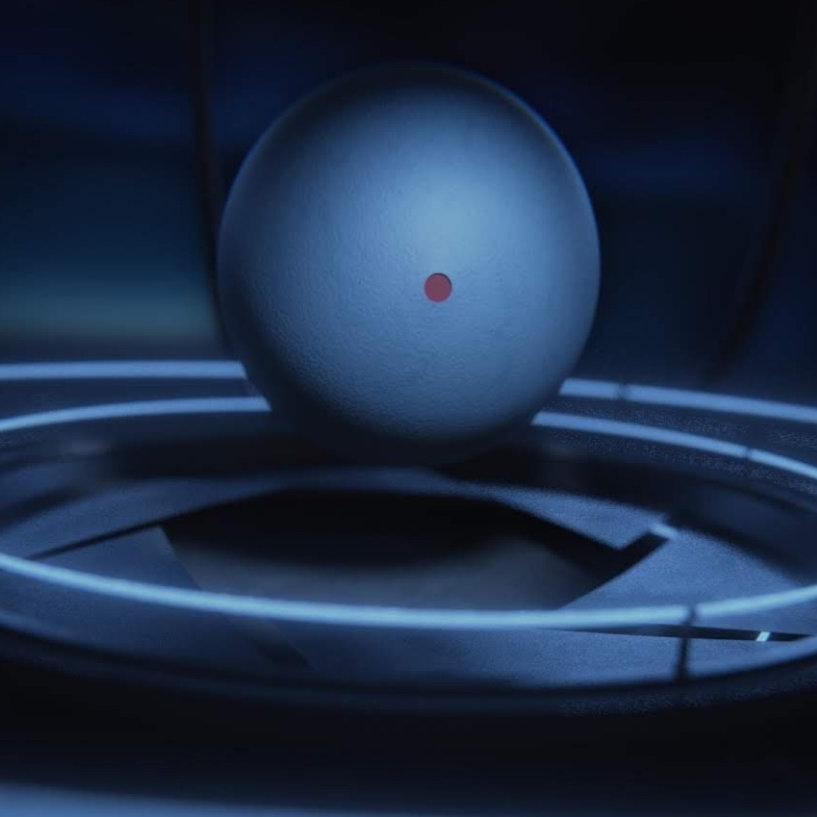 3D squash ball floating above platform in stylized, futuristic setting.