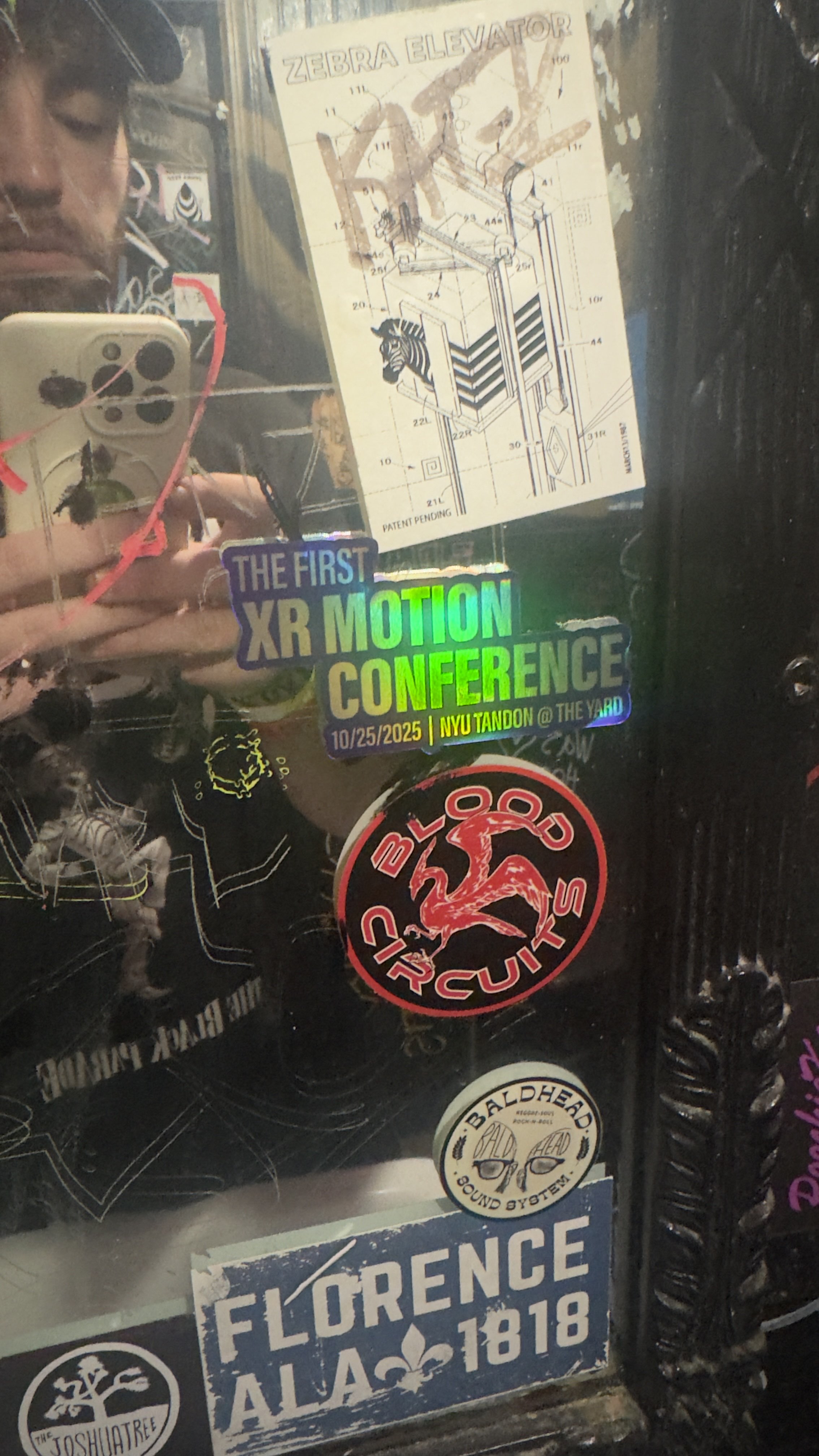 XR Motion Conference stickers make an appearance in the wild on a mirror somewhere in NYC.